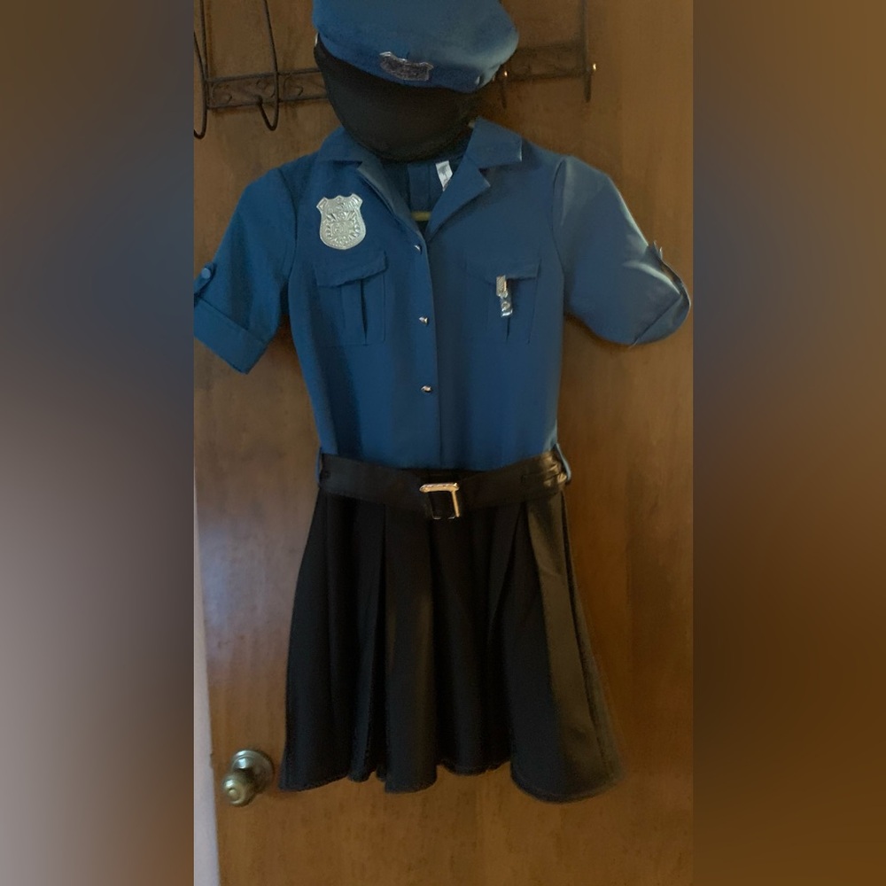Halloween costume cop, woman, mini dress costume, with hat, handcuffs.